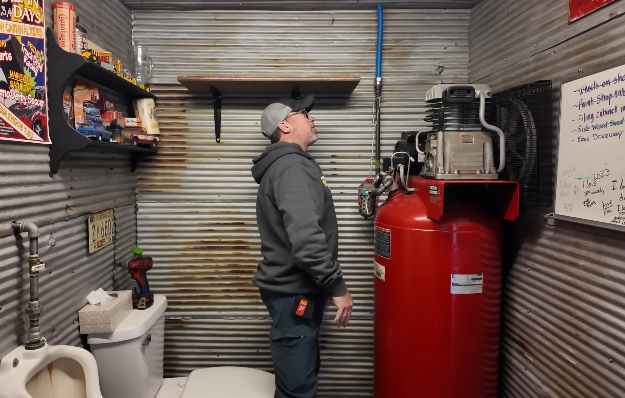 Neil scoping NAS placement on a shelf in his shop